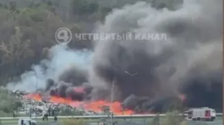 На ВИЗе рядом с ТЦ «Мега» загорелась свалка На ВИЗе рядом с ТЦ «Мега» загорелась свалка